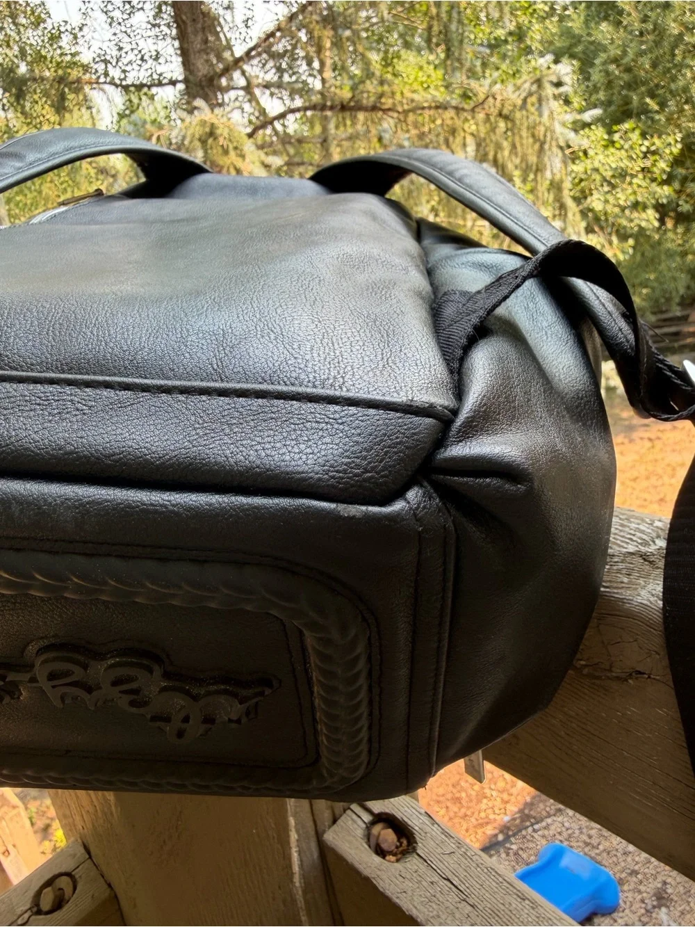 Itzy Ritzy Black Faux Leather Baby Backpack with Tassel Charm